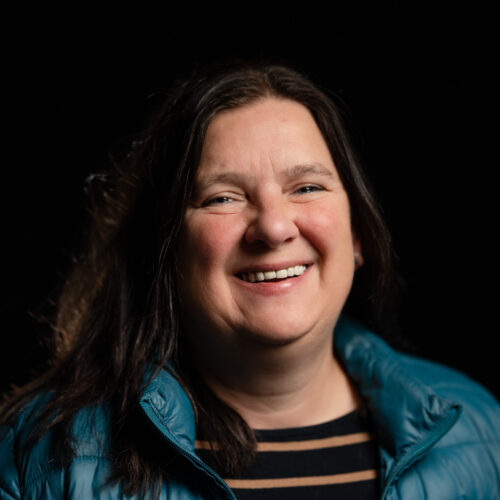 A photo of heritage specialist, Zoe Gilbert, smiling
